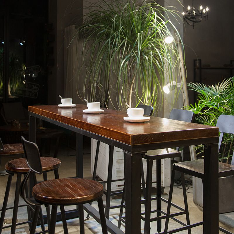 Mesa de comedor de barra de estilo industrial Mesa de taburete de barra de madera maciza con base negra