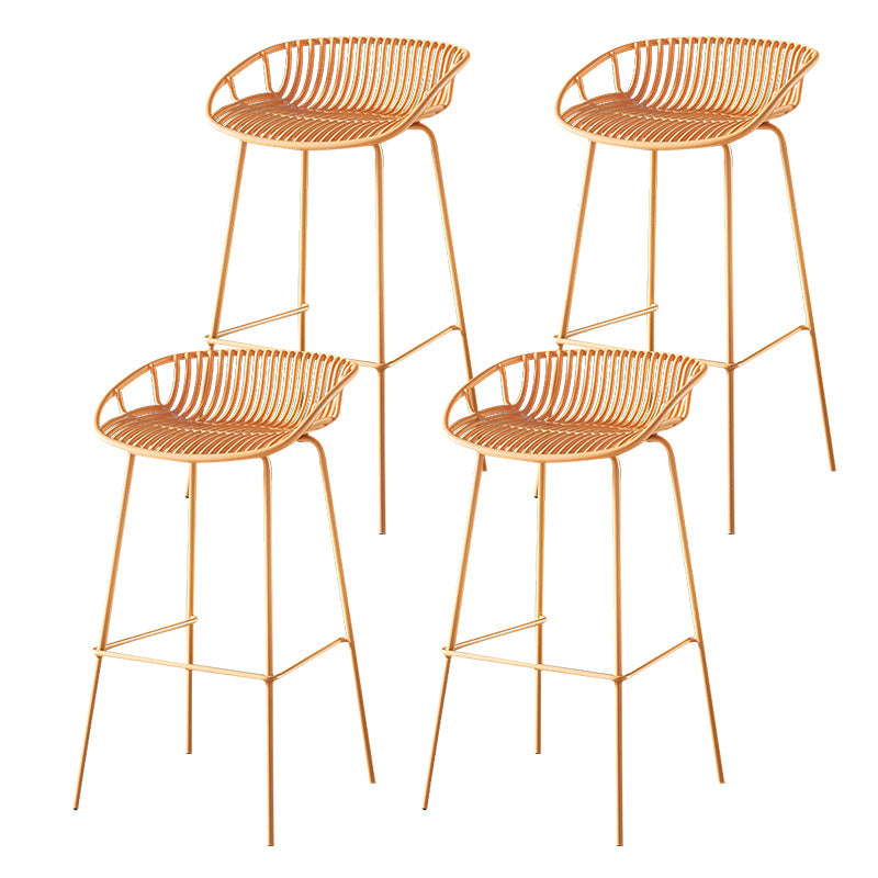 29-Inch Contemporary Bar Stool Armless Plastic Indoor Bar Stool with Iron Base Yellow 4 Piece Set Clearhalo 'Bar Furniture' 'Bar Stools' 'bar_stools' 'furn' 'furn_bar_stools' 'furniture_bar_stools' 'Kitchen & Dining Furniture' 'kitchen&dining_furn' 'kitchen' 'kitchen_furn' Furniture' 4184556
