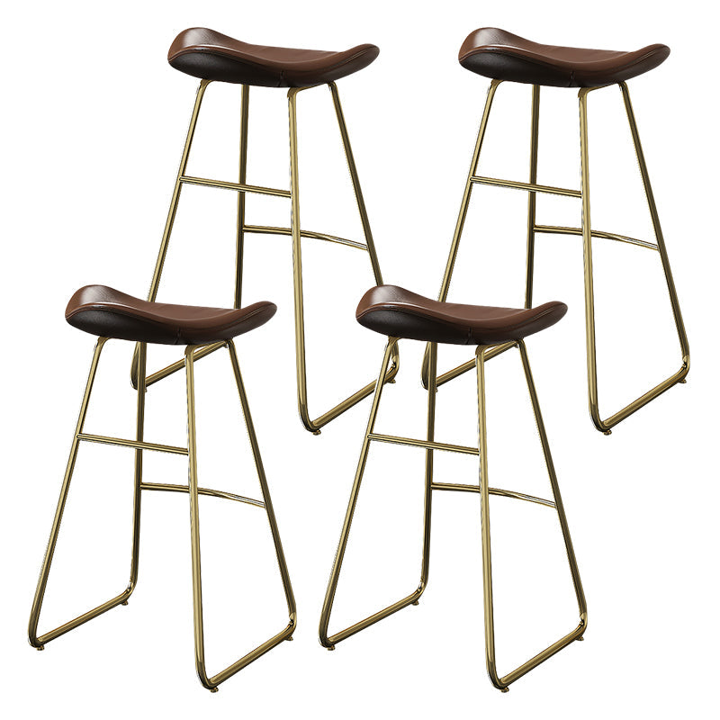 Glam Counter Bar Stool Armless Leather Indoor Bar Stool with Footrest Iron Base Gold 4 Piece Set Clearhalo 'Bar Furniture' 'Bar Stools' 'bar_stools' 'furn' 'furn_bar_stools' 'furniture_bar_stools' 'Kitchen & Dining Furniture' 'kitchen&dining_furn' 'kitchen' 'kitchen_furn' Furniture' 4275484