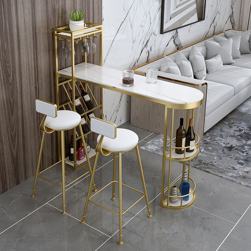 Stone Indoor Glam Bar Dining Table Metal Double Pedestal Bistro Table with Wine Rack 70.9"L x 15.7"W x 41.3"H Gold Without Chairs Clearhalo 'Bar Furniture' 'Bar Tables' 'bar_tables' 'furn' 'furn_bar_tables' 'Furniture' 'furniture_bar_tables' 'Kitchen & Dining Furniture' 'kitchen&dining_furn' 'kitchen' 4296279