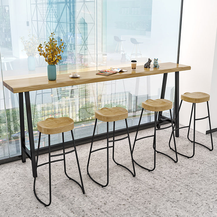 Natural and Black Modern Counter Table Trestle Footrest Bistro Bar Table 118.1"L x 15.7"W x 41.3"H Without Chairs Clearhalo 'Bar Furniture' 'Bar Tables' 'bar_tables' 'furn' 'furn_bar_tables' 'Furniture' 'furniture_bar_tables' 'Kitchen & Dining Furniture' 4344989