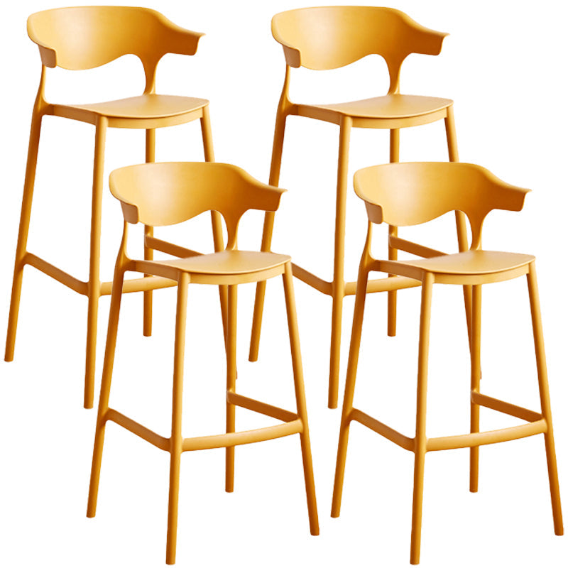 Stackable Plastic Indoor Counter Stools Low Back Scandinavian Bar Stools with 4 Legs Yellow 4 Piece Set Bar Stool(30"H) Clearhalo 'Bar Furniture' 'Bar Stools' 'bar_stools' 'furn' 'furn_bar_stools' 'furniture_bar_stools' 'Kitchen & Dining Furniture' 'kitchen&dining_furn' 'kitchen' 'kitchen_furn' Furniture' 4392539