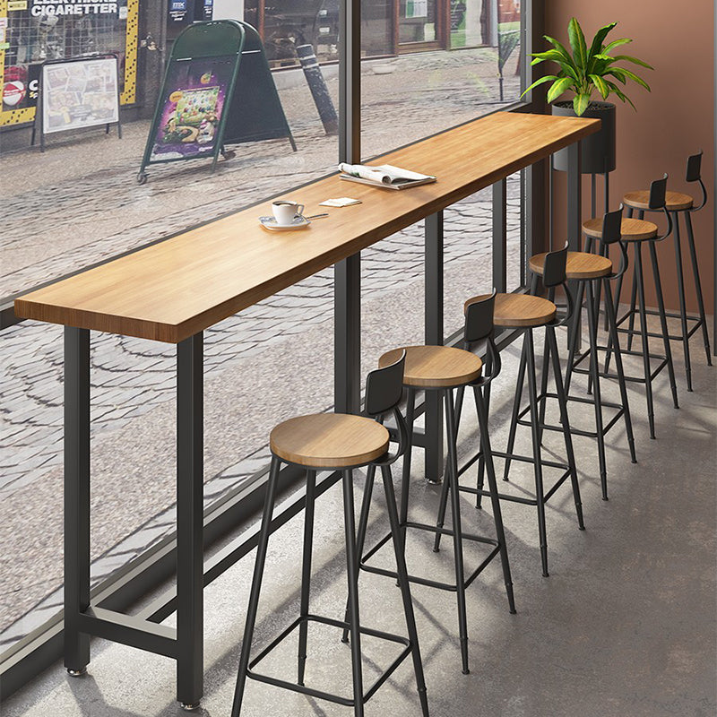 Brown Modern Style Bar Table Solid Wood Coffee Shop Bar Table with Metal Base 110.2"L x 15.7"W x 41.3"H Without Chairs Clearhalo 'Bar Furniture' 'Bar Tables' 'bar_tables' 'furn' 'furn_bar_tables' 'Furniture' 'furniture_bar_tables' 'Kitchen & Dining Furniture' 4586846