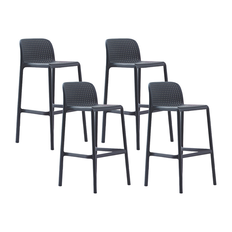 Scandinavian Plastic Kitchen Dining Room Stool Low Back Armless Bar Stool Black 4 Piece Set Bar Stool (28" H) Clearhalo 'Bar Furniture' 'Bar Stools' 'bar_stools' 'furn' 'furn_bar_stools' 'furniture_bar_stools' 'Kitchen & Dining Furniture' 'kitchen&dining_furn' 'kitchen' 'kitchen_furn' Furniture' 4665269
