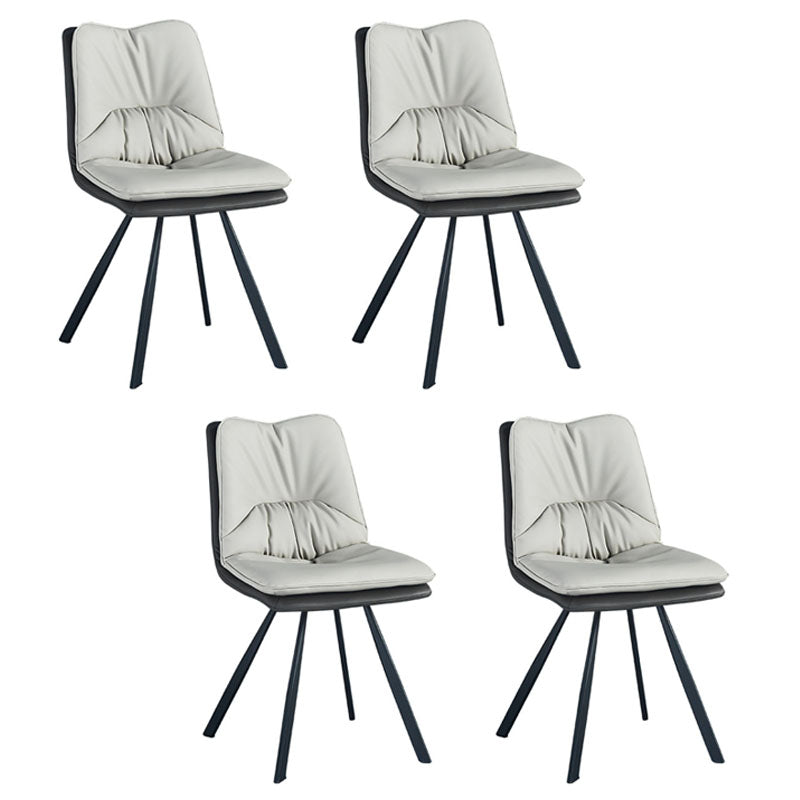 Industrial Design Armless Solid Back Chair Faux Leather Side Chair Beige 4 Piece Set Clearhalo 'Dining Chairs' 'Dining Tables & Seating' 'dining_chair' 'furn' 'furn_dining_chair' 'Furniture' 'furniture_dining_chair' 'Kitchen & Dining Furniture' 4782027