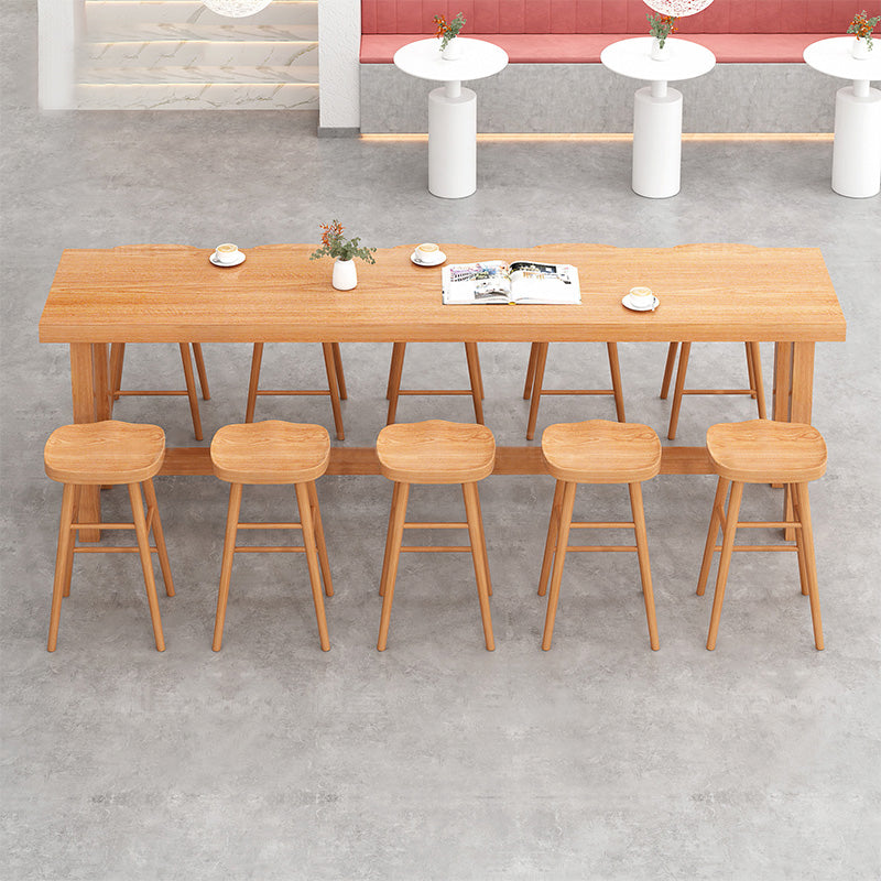Modern Beige Wood Bar Dining Table Rectangle Indoor Bistro Table with Footrest 94.5"L x 17.7"W x 41.3"H Without Chairs Clearhalo 'Bar Furniture' 'Bar Tables' 'bar_tables' 'furn' 'furn_bar_tables' 'Furniture' 'furniture_bar_tables' 'Kitchen & Dining Furniture' 4888349