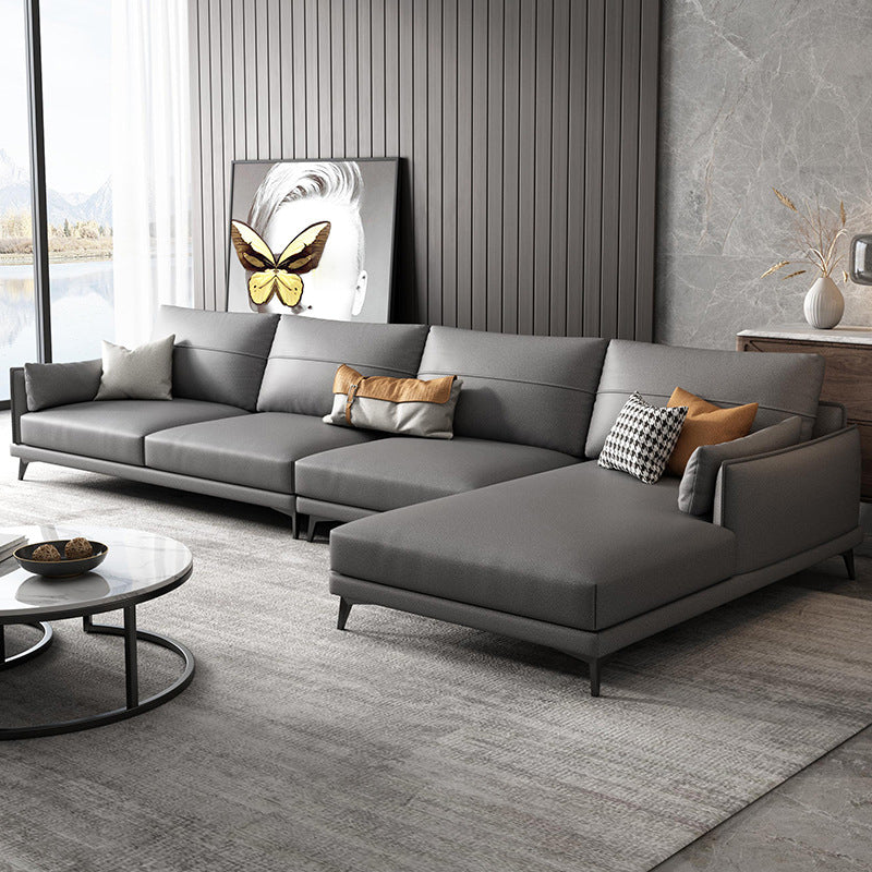 Moderno divano sezionale in pelle finta cuscino grigio scuro posteriore sezionale per soggiorno