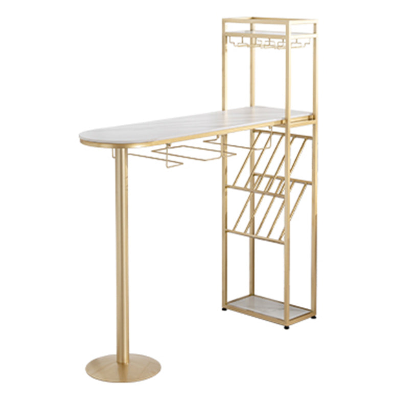 Soggiorno altezza pub altezza tavolo da pranzo in pietra e tavolo da bistrot metallico con portaoggetti