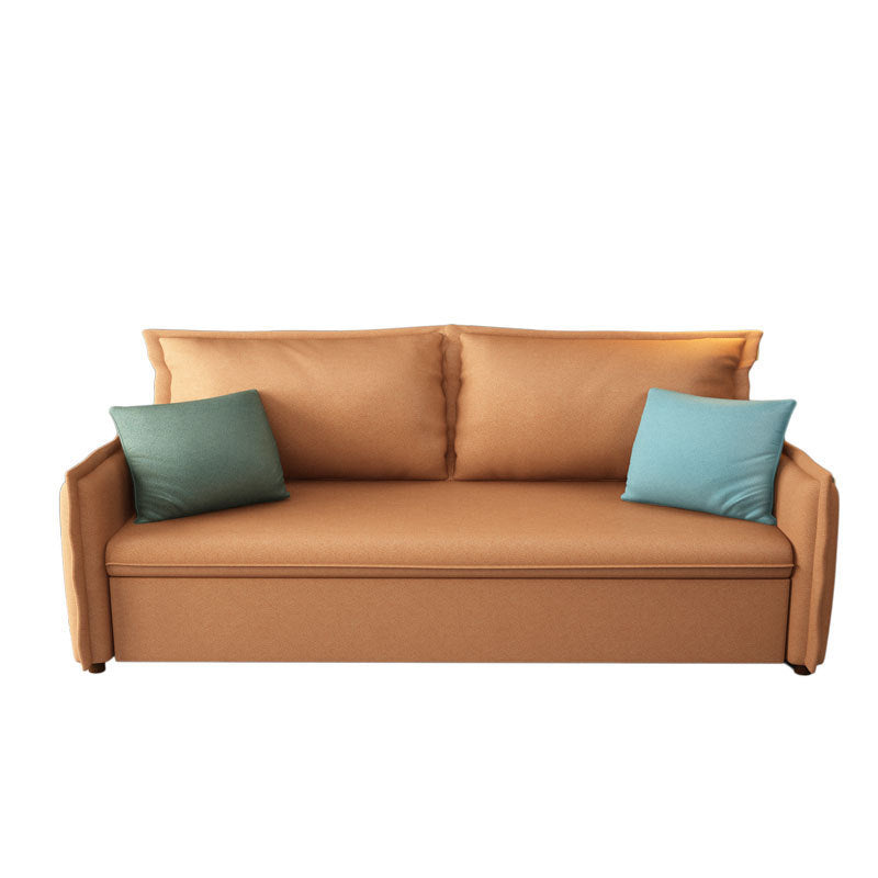 Canapé-lit orange en s'amuser avec 2 oreillers en arrière et bras carré