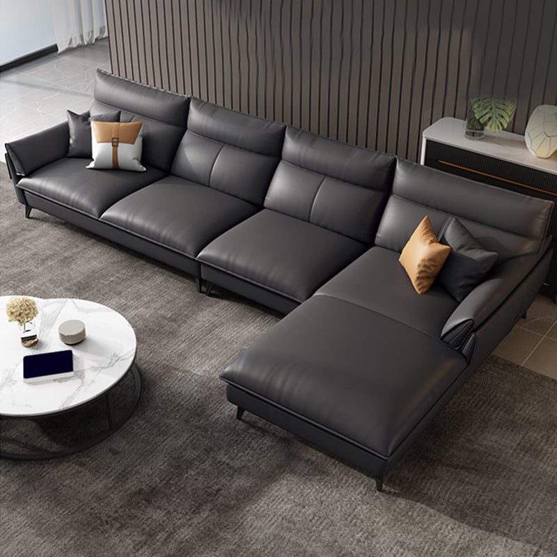 Divano in pelle nera/grigio bracciolo e cuscinetto spugna posteriore/sedile in lattice.