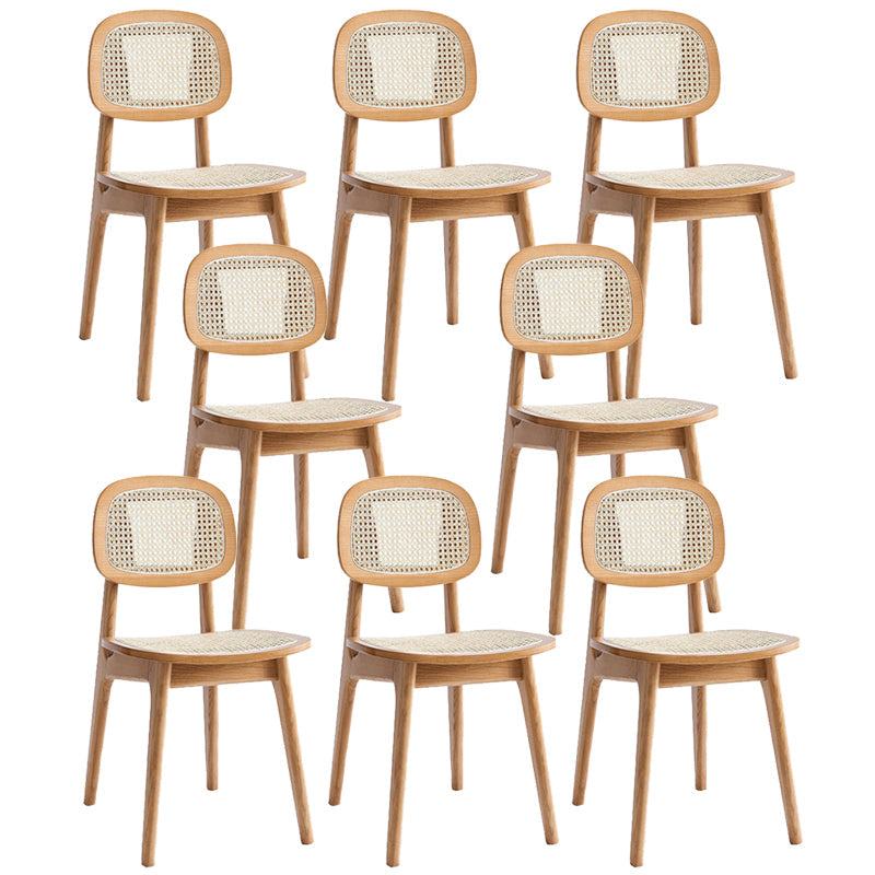 Sillas de comedor de ratán modernas muebles de comedor abiertos con patas de madera en acabado mate