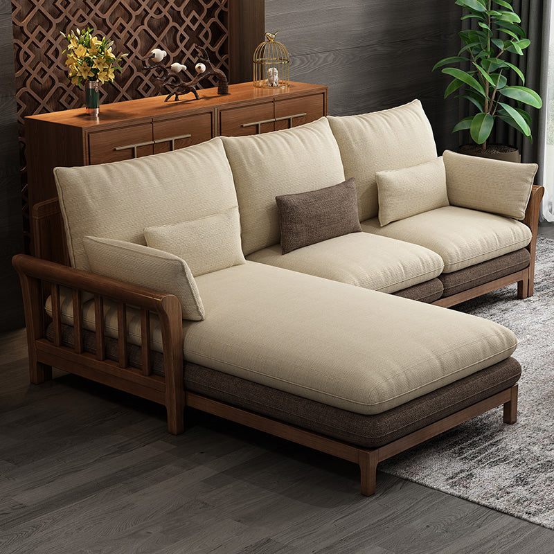 Divano sezionale braccio svasato, cuscini rimovibili con gambe di legno