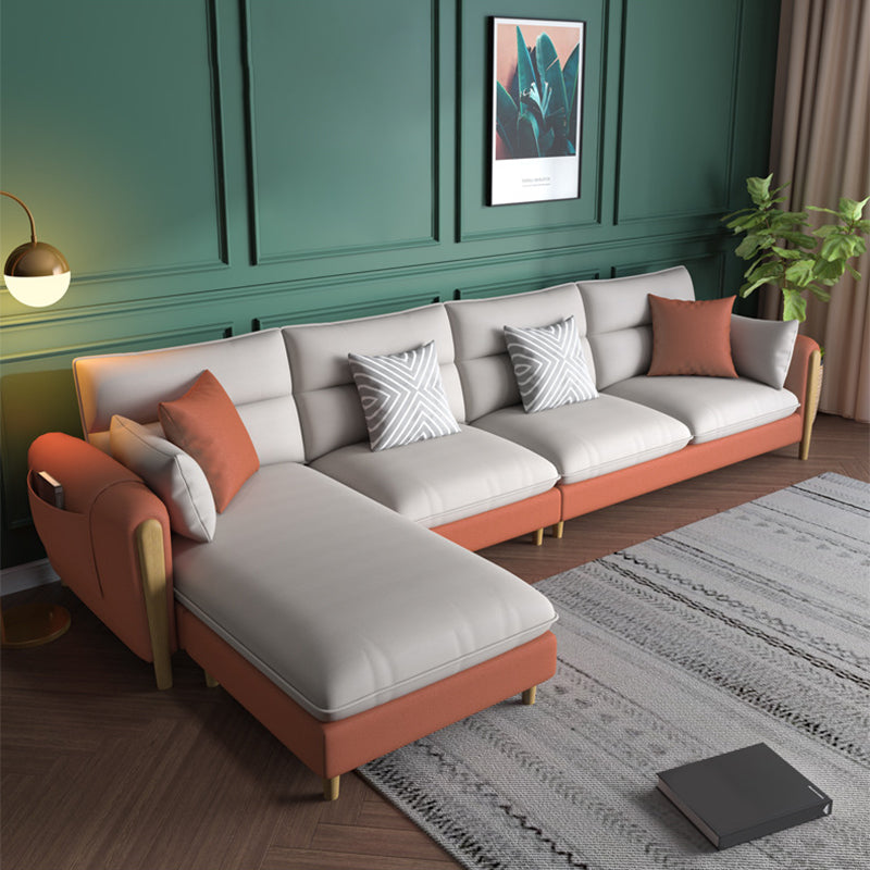 Divano sezionale del braccio rotondo con ottoman sezionale in pelle finta