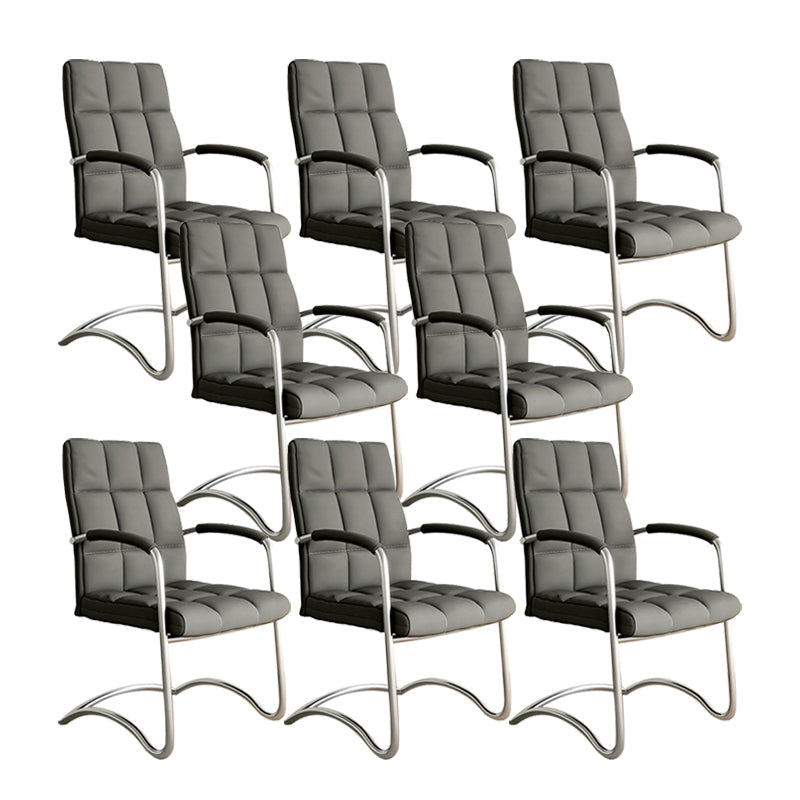 Sedia da scrivania a bracci fissi moderni in vetro in vetro.