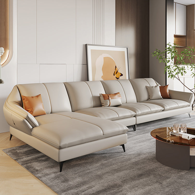 Divano sezionale contemporaneo beige in pelle sezionale con cuscini