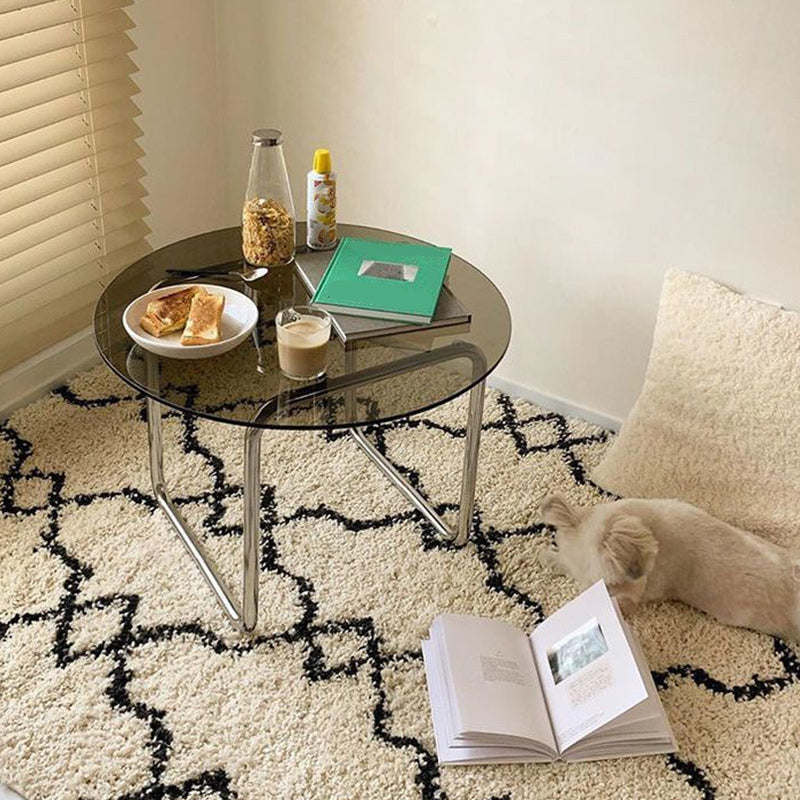 Mesa de café de vidrio redondo moderno con basura de acero inoxidable de trineo manchado