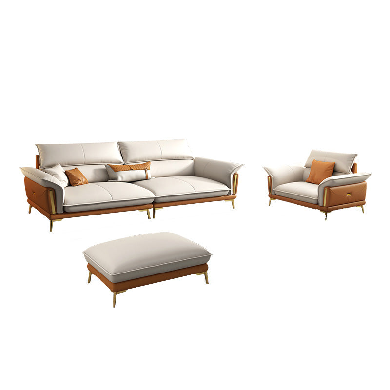 Glam lederen woonkamer zitplaatsen wijd uitlopende armkussens witte bank