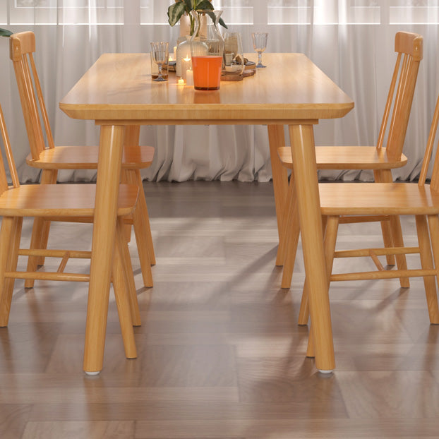 Mesa de comedor rectangular de madera maciza de pino con patas con acabado natural