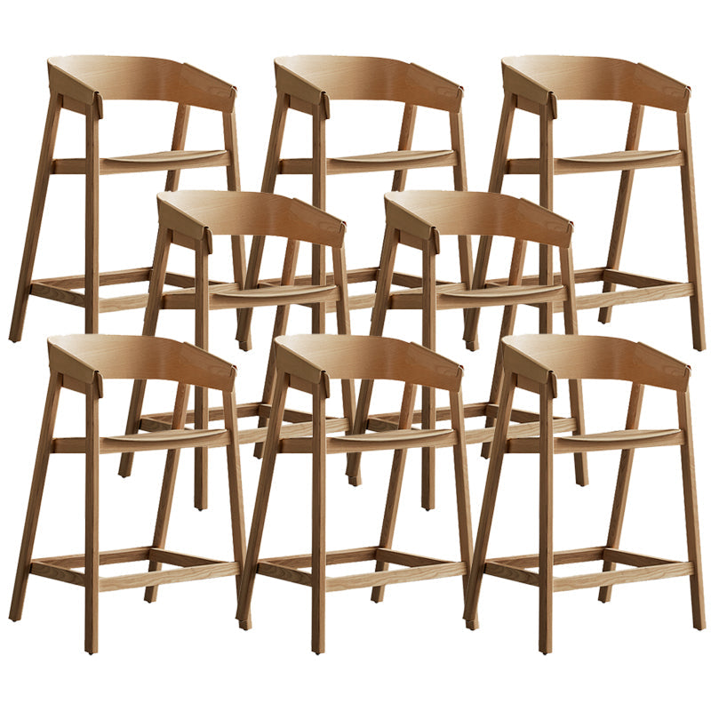Tabourets de comptoir en bois brun