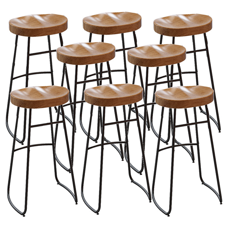 Armless Dining Stool Contemporary Bar Stool with Black Metal Base 8 Piece Set Non-Upholstered Saddle Clearhalo 'Bar Furniture' 'Bar Stools' 'bar_stools' 'furn' 'furn_bar_stools' 'Furniture' 'Kitchen & Dining Furniture' 7016444