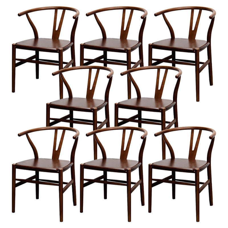 Silla de respaldo moderna de reposabrazos con patas de madera para el comedor