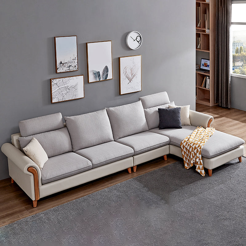 Sezionali di tessuto posteriore a cuscinetto svasato con un divano scandinavo con chaise