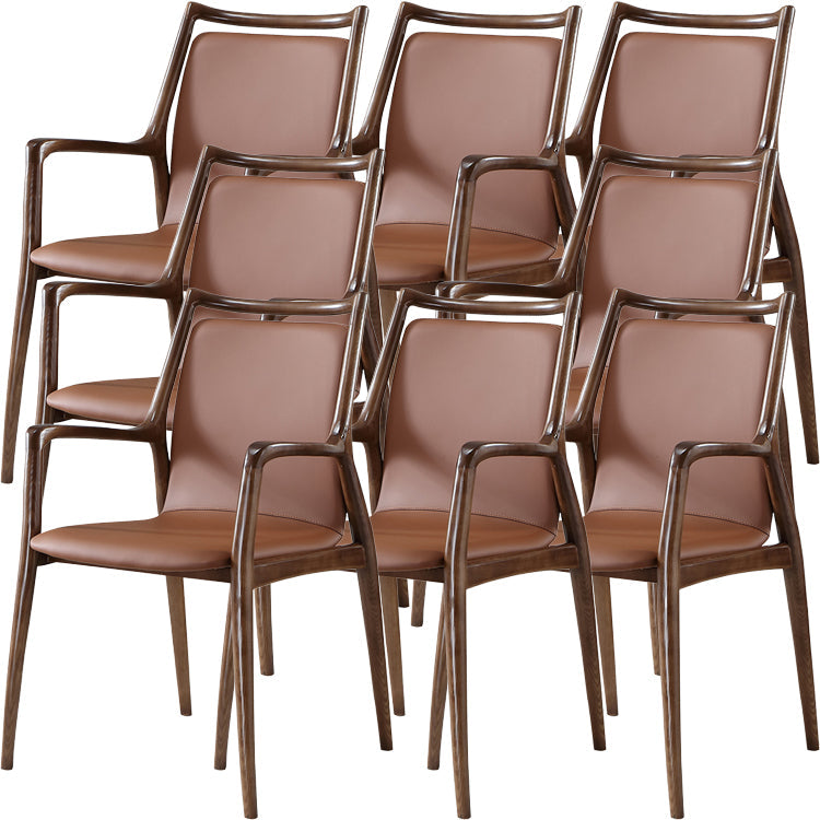 Silla de comedor de brazo de cuero de estilo nórdico en madera sólida para el hogar