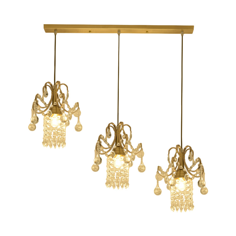 Crystal Drip Cylindrical Island Lighting Minimalist 3 Bulbs Brass Suspension Lamp over Dining Table Clearhalo 'Ceiling Lights' 'Modern Pendants' 'Modern' 'Pendant Lights' 'Pendants' Lighting' 1136310