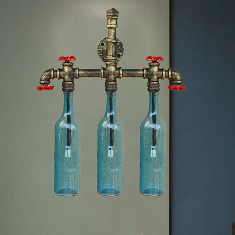 Wrought Iron Bottle Wall Light Antique 3 Lights Living Room Blue/Clear Wall Mounted Lamp with Aged Brass Pipe Clearhalo 'Cast Iron' 'Glass' 'Industrial wall lights' 'Industrial' 'Middle century wall lights' 'Modern' 'Tiffany' 'Traditional wall lights' 'Wall Lamps & Sconces' 'Wall Lights' Lighting' 1416700