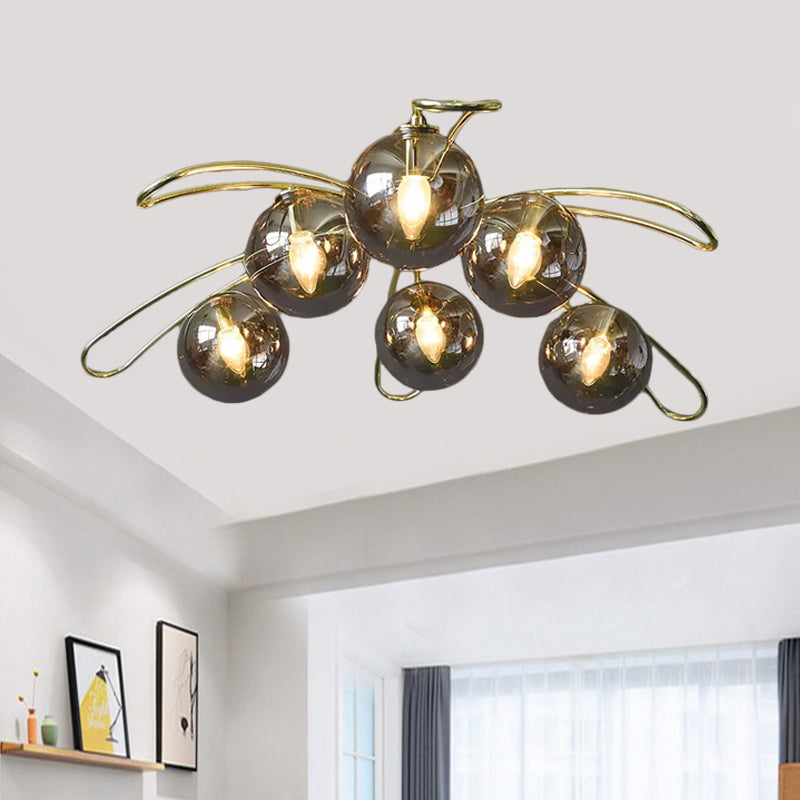 Smoke Glass Ball Flush Chandelier Mid Century 6 Lights Brass Ceiling Mount Lamp with Branch Design Clearhalo 'Ceiling Lights' 'Close To Ceiling Lights' 'Close to ceiling' 'Glass shade' 'Glass' 'Semi-flushmount' Lighting' 1454848