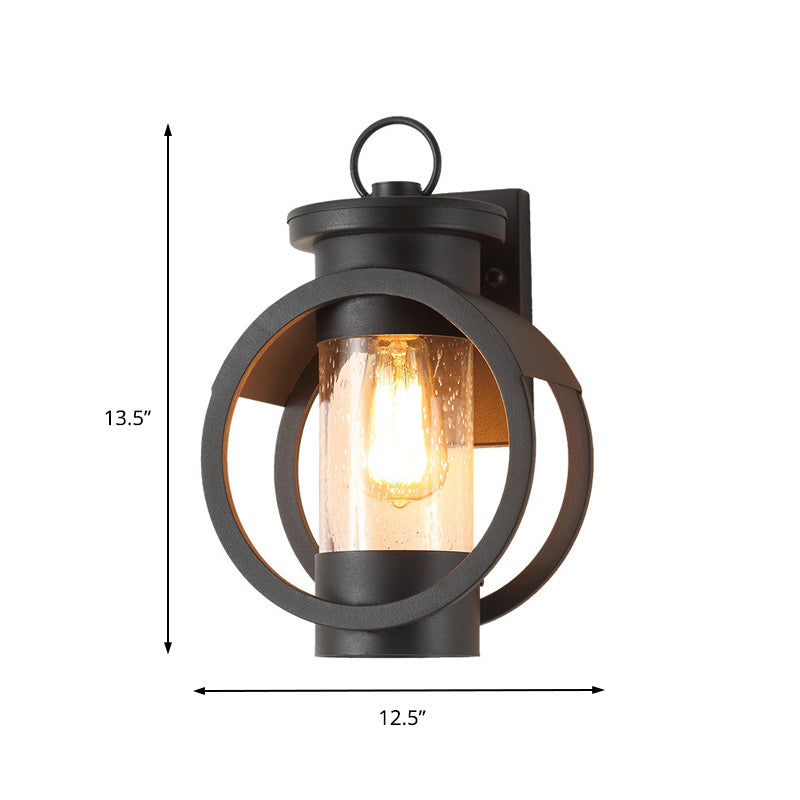 1 Light Cylinder Sconce Light Vintage Black Clear Seedy Glass Wall Lamp with Round Frame Clearhalo 'Art deco wall lights' 'Cast Iron' 'Glass' 'Industrial wall lights' 'Industrial' 'Middle century wall lights' 'Modern' 'Rustic wall lights' 'Tiffany' 'Traditional wall lights' 'Wall Lamps & Sconces' 'Wall Lights' Lighting' 150170