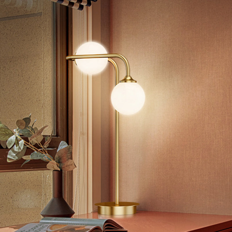 Global Milky Glass Table Lighting Minimalist 2-Head Gold Nightstand Lamp with Metal Arm Clearhalo 'Lamps' 'Table Lamps' Lighting' 1781670