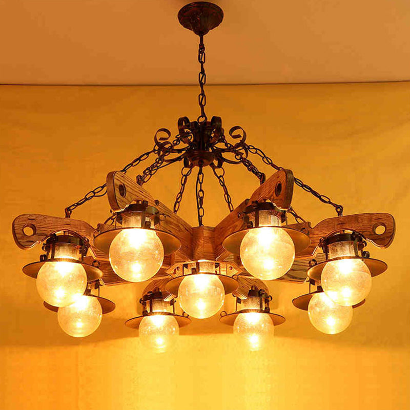 5/9 Lights Ball Pendant Lighting Cognac Seeded Glass Industrial Chandelier in Rust Clearhalo 'Carpenter Chandeliers' 'Ceiling Lights' 'Chandeliers' 'Industrial Chandeliers' 'Industrial' 'Middle Century Chandeliers' 'Modern' 'Tiffany' Lighting' 1950142