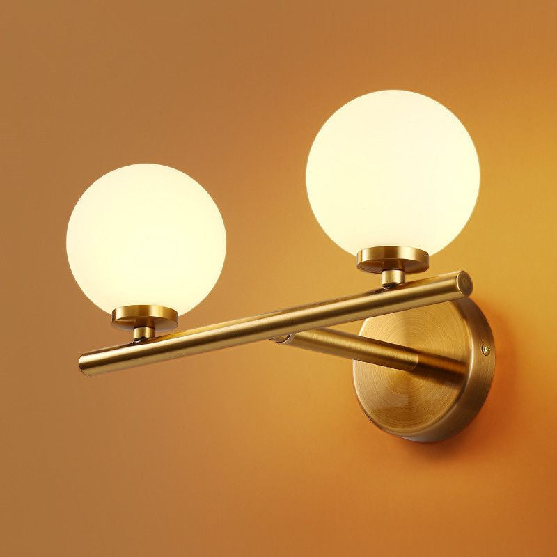 Ball Sconce Lighting Postmodern Opal Glass Corridor Wall Mounted Light Fixture in Brass Clearhalo 'Cast Iron' 'Glass' 'Industrial' 'Modern wall lights' 'Modern' 'Tiffany' 'Traditional wall lights' 'Wall Lamps & Sconces' 'Wall Lights' Lighting' 2283200