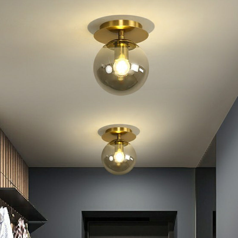 Ball Foyer Semi Flush Mount Lighting Glass 1-Light Postmodern Ceiling Light in Brass Clearhalo 'Ceiling Lights' 'Close To Ceiling Lights' 'Close to ceiling' 'Semi-flushmount' Lighting' 2353947