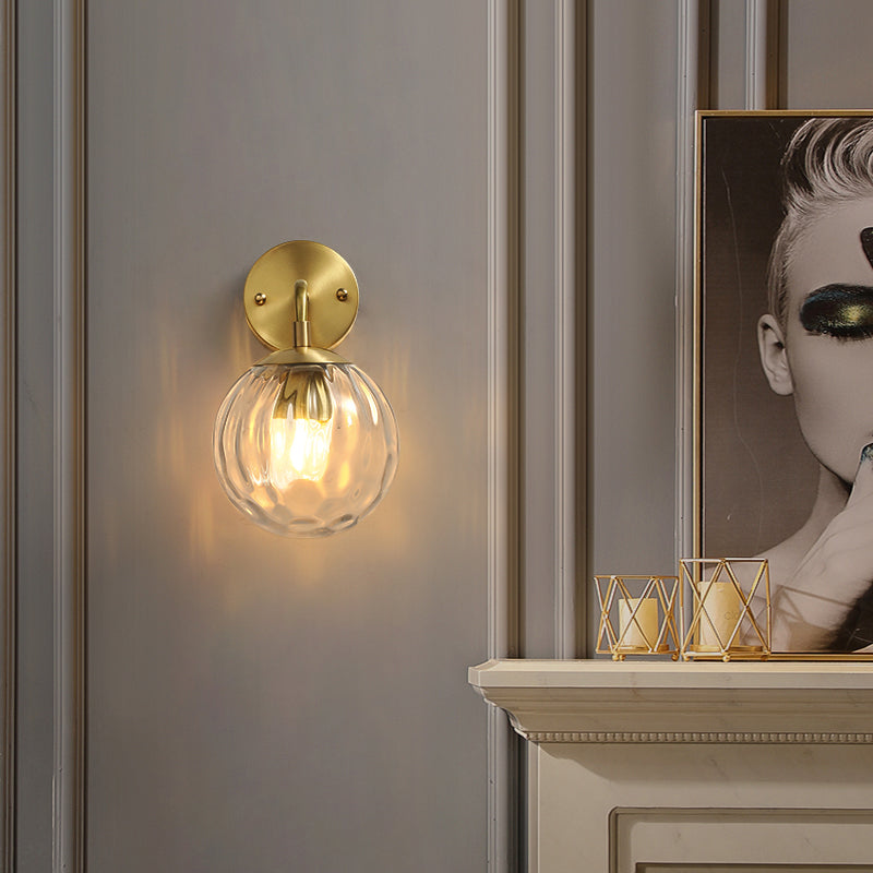Clear Ripple Glass Ball Wall Light Minimalistic 1-Light Brass Sconce Fixture for Dining Room Clearhalo 'Cast Iron' 'Glass' 'Industrial' 'Modern wall lights' 'Modern' 'Tiffany' 'Traditional wall lights' 'Wall Lamps & Sconces' 'Wall Lights' Lighting' 2356782