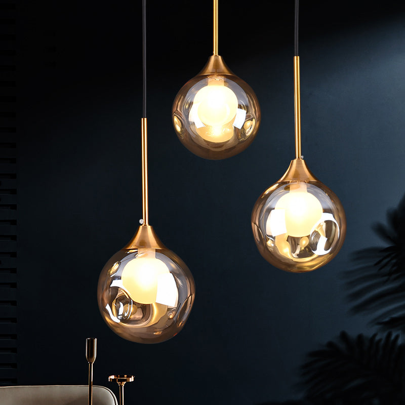 Ball Down Lighting Pendant Minimalism Glass 3-Head Dining Room Multiple Hanging Light Clearhalo 'Ceiling Lights' 'Modern Pendants' 'Modern' 'Pendant Lights' 'Pendants' Lighting' 2408791