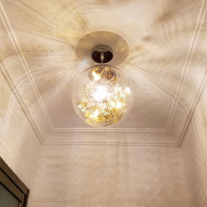 Globe Suspension Lighting Simple Clear Glass 1-Head Dining Room Pendant Light with Foil Flower Inside Clearhalo 'Ceiling Lights' 'Close To Ceiling Lights' 'Glass shade' 'Glass' 'Modern Pendants' 'Modern' 'Pendant Lights' 'Pendants' Lighting' 2461753