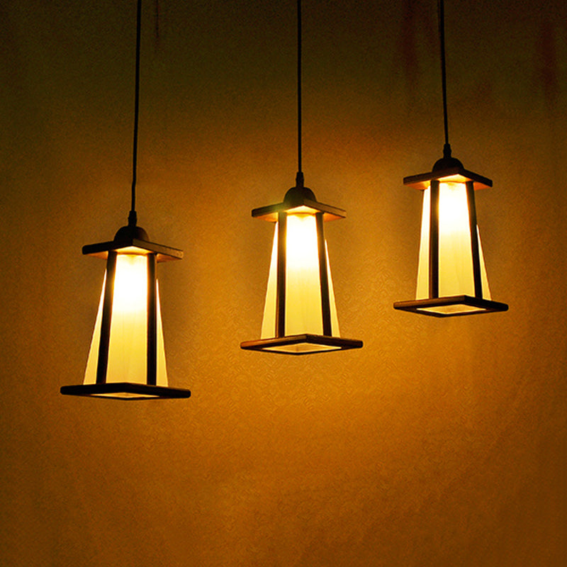 Wood 3 Lights Cluster Pendant Coastal Frosted Glass Trapezoid Hanging Ceiling Light with Linear/Triangle Canopy Clearhalo 'Ceiling Lights' 'Industrial Pendants' 'Industrial' 'Middle Century Pendants' 'Pendant Lights' 'Pendants' 'Tiffany' Lighting' 736174