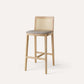 Tabouret de bar rembourré sans bras contemporain avec base en bois massif