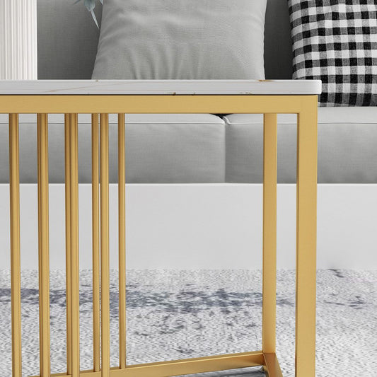 Tavolo da cocktail glam in pietra con base a croce di ferro dorato nel rettangolo