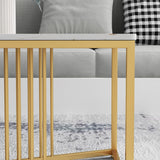 Tavolo da cocktail glam in pietra con base a croce di ferro dorato nel rettangolo