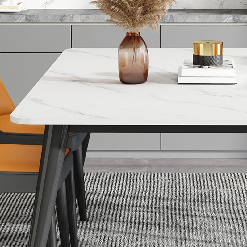 Mesa de comedor de piedra rectangular de lujo con 4 patas de acero dorado y negro