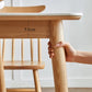 Moderne massief houten poten eettafel met rechthoekig stenen blad