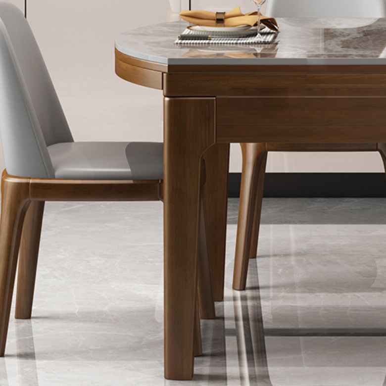 Mesa de comedor redonda moderna de piedra extensible para espacios pequeños en gris