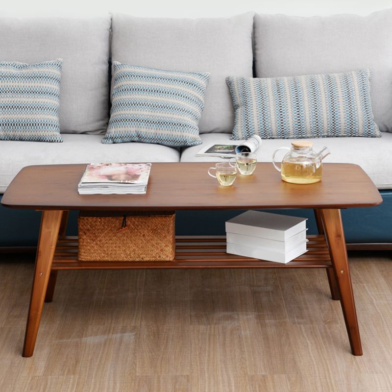 Rectangular Coffee Table with Walnut/wood-colored Top on 4-leg Base Clearhalo 'Coffee & Accent Tables' 'Coffee Tables' 'coffee_tables' 'furn' 'furn_coffee_tables' 'Furniture' 'furniture_coffee_tables' 'Living Room Furniture' 1200x1200_00fad788-6927-4729-a889-7111ff486c10