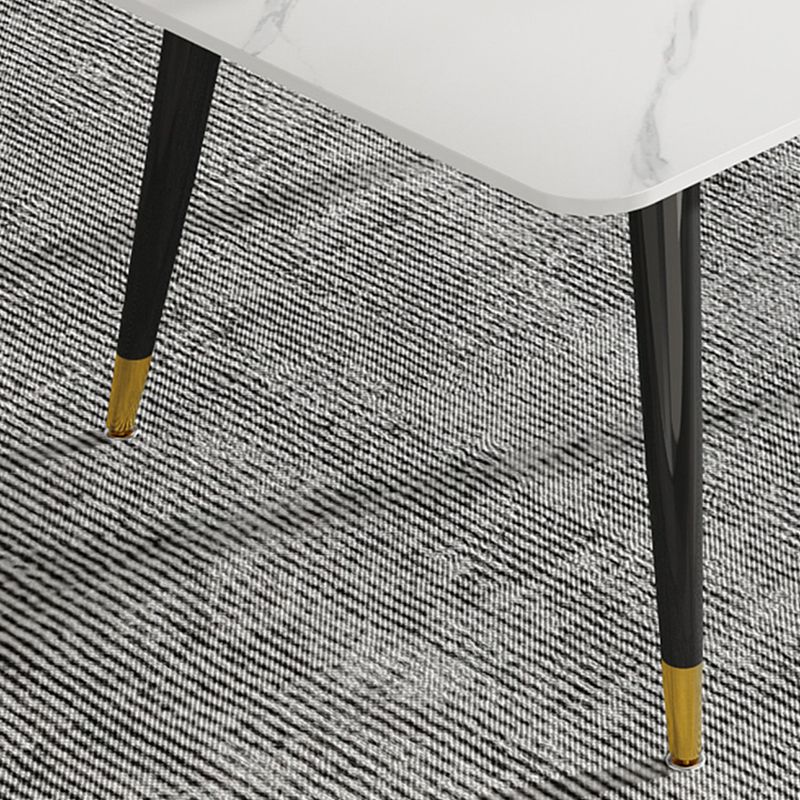 Mesa de comedor de piedra rectangular de lujo con 4 patas de acero dorado y negro