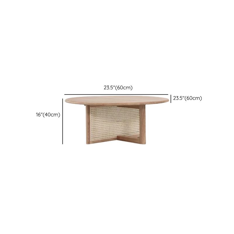 Tavolino scandinavo rotondo con gambe incrociate in legno di pino