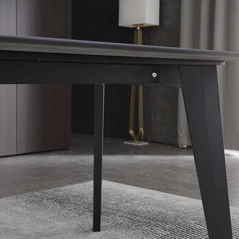 Table à manger noire rectangle industrielle en pierre fritrée avec 4 jambes