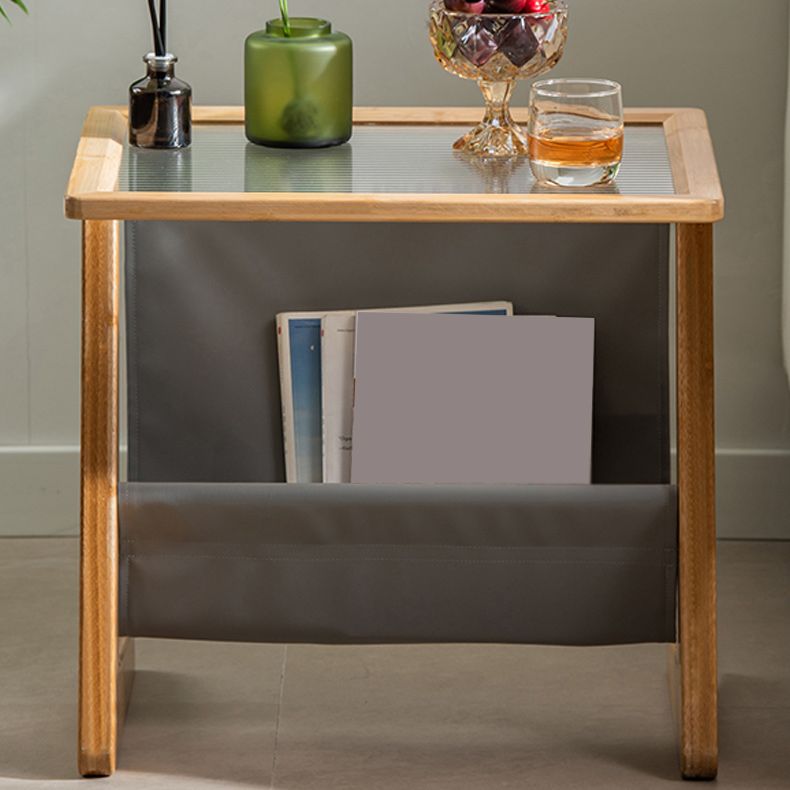 Mesa lateral de vidrio rectángulo moderno Mesa de base abstracta de madera con soporte de revista